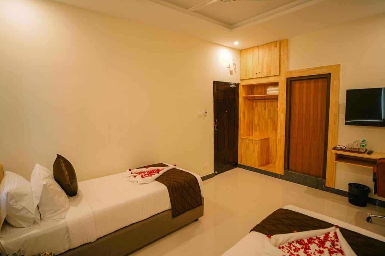 Tpc Camphor Hotel Tiruchirappalli Bagian luar foto